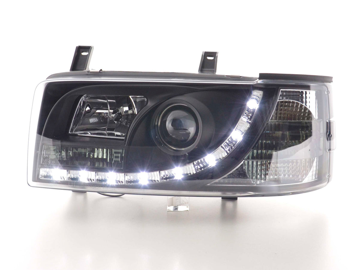 Scheinwerfer Set Daylight LED TFL-Optik VW Bus Typ T5 03-09 schwarz Scheinwerfer Set Daylight LED TFL-Optik VW Bus Typ T5 03-09 schwarz